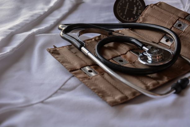 Stethoscope on top of felt pouch